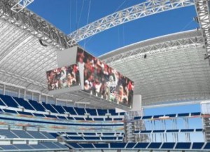 The new video screen at Cowboys Stadium was hit by a punt during the first preseason game at the new facility.