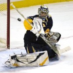 Ryan Miller makes a save in the first period.