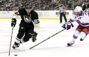 Sidney Crosby looks on his way to winning the 2014 Art Ross Trophy as the NHL scoring leader.